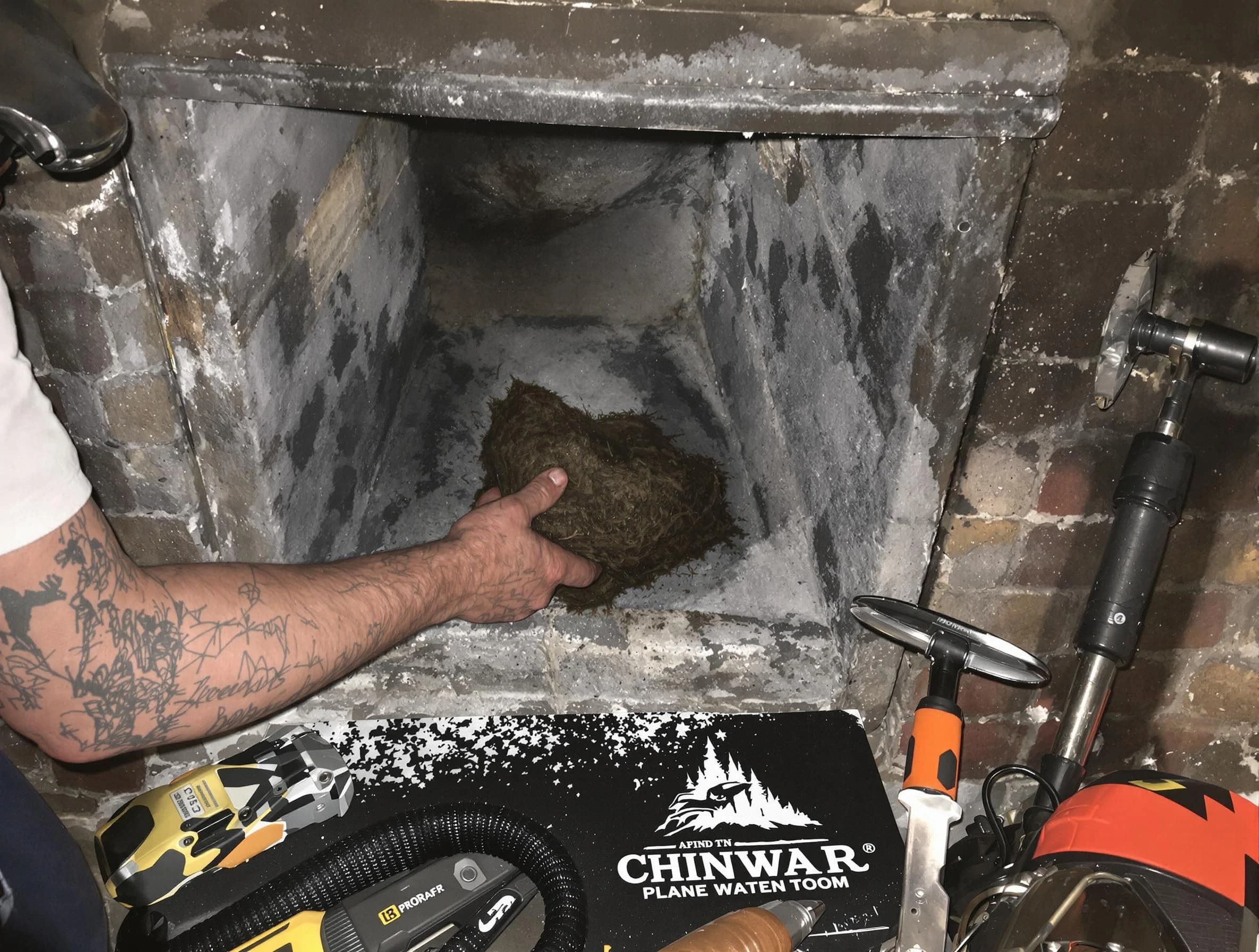 Phoenix Chimney Sweep safely removing debris and screening chimney in Phoenix, AZ